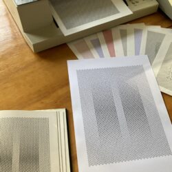 A book with an image of Arthur Hoener's Duo, together with a pen plotted recreation.