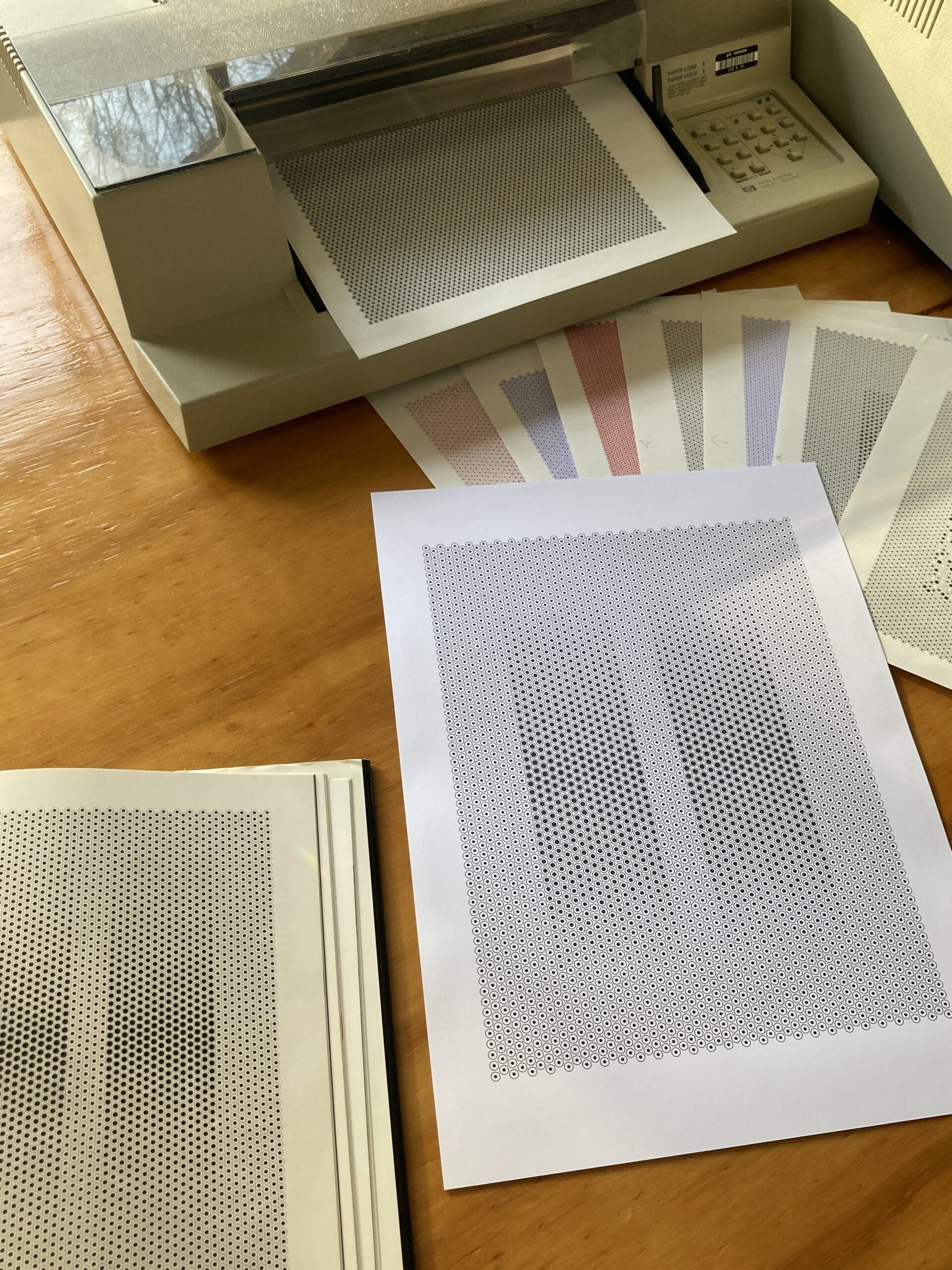 A book with an image of Arthur Hoener's Duo, together with a pen plotted recreation.